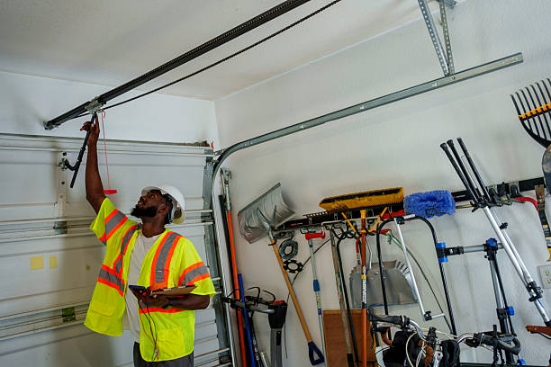 Professional Garage Door Panel Replacement technician working in Dewey, OK
